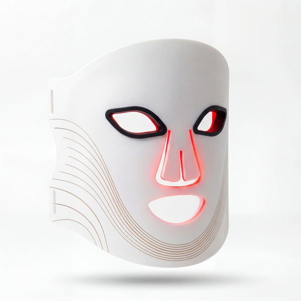 Masque LED visage Auréa™ en silicone souple, vue de trois quarts, lumière rouge